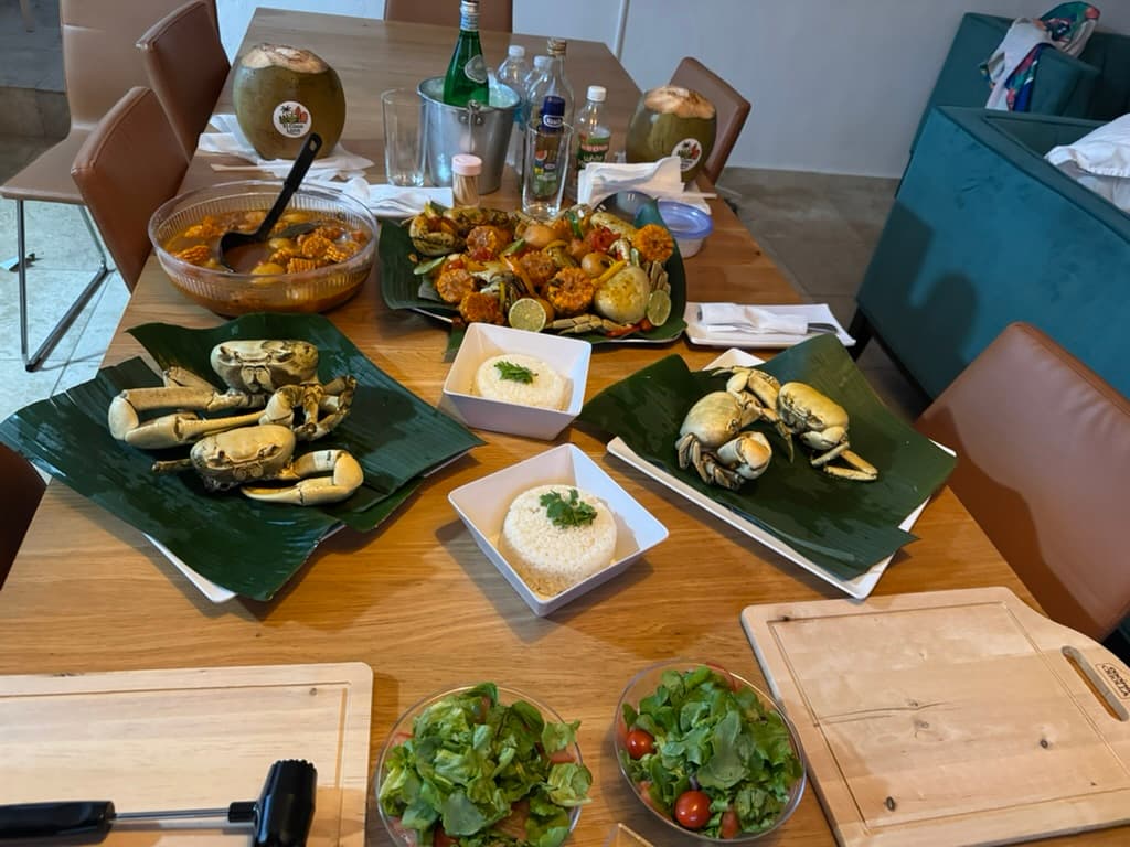 Full family-style table setup for a seasonal local crab feast
