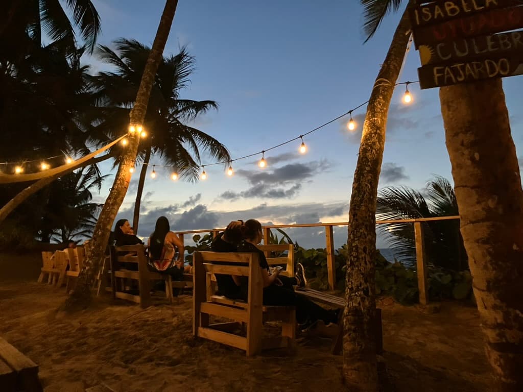 Beach bar with string lights at night